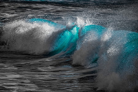 selective color photography of ocean waves thumbnail