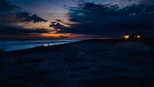 body of water under orange sunset thumbnail