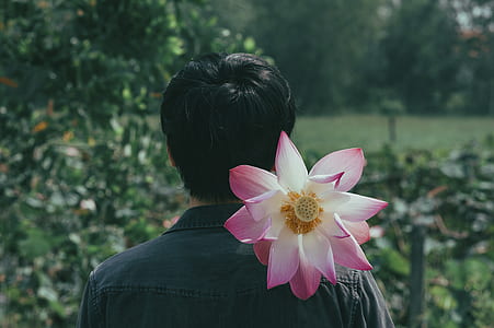 Pink Flowers on the Shoulder of Person thumbnail