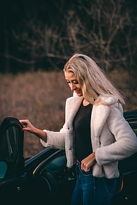 woman standing vehicle door thumbnail