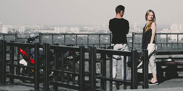 man wearing black shirtbeside woman thumbnail