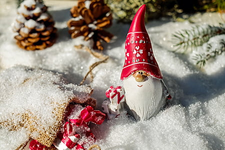gnome Santa figurine on snow ground thumbnail