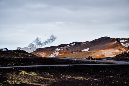 photo of road between mountains thumbnail
