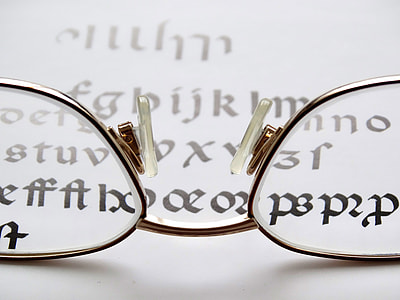 Reading Glasses looking at words thumbnail