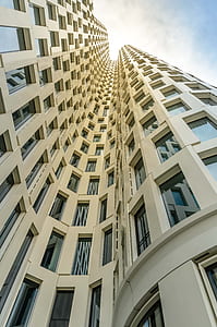 low-angle photography of high rise building at daytime thumbnail