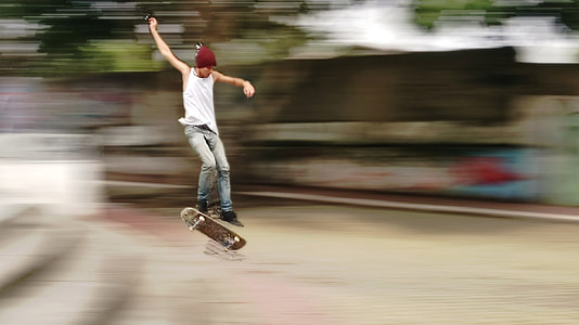 man riding on skateboard thumbnail