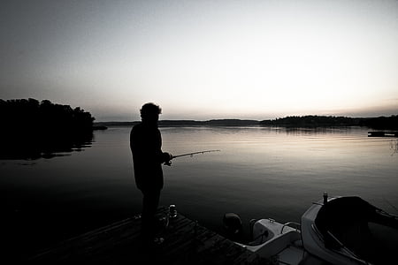 person fishing during daytime thumbnail