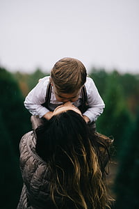 woman kissing boy thumbnail
