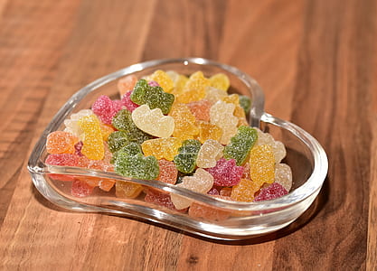 gummy bear candies in glass heart bowl thumbnail