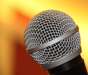 selective focus photo of gray and black microphone thumbnail