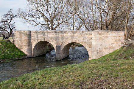 concrete bridge over body of water thumbnail