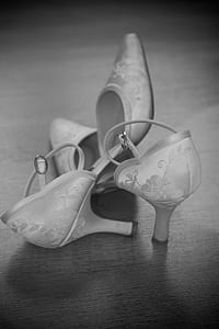 closeup photography of white floral Mary Jane kitten heeled sandals thumbnail