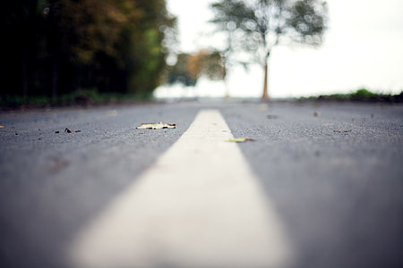close up photo of gray road thumbnail
