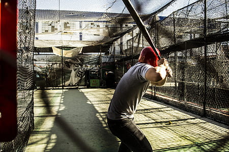 man holding baseball bat thumbnail