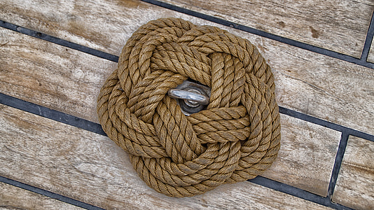 brown rope on slatted plank thumbnail