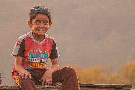 Boy Sitting On Bench thumbnail