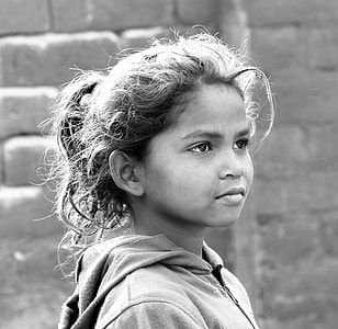 grayscale photo of girl wearing hoodie thumbnail
