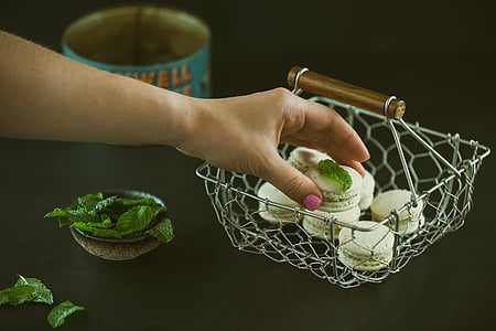 white macarons on grey tray thumbnail