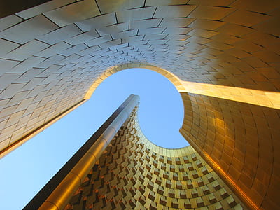 bottom view photo of gold-colored building thumbnail