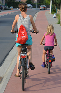 woman wearing orange drawstring bag thumbnail