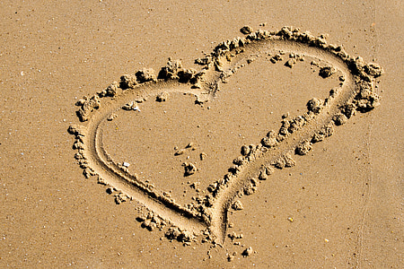 heart illustration on beige sand thumbnail
