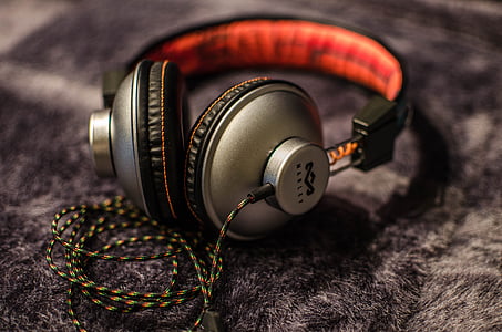 selective focus photograph of gray and black corded headphones thumbnail