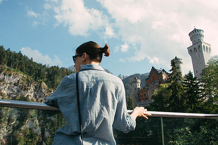 Girl near the castle Neuschwanstein thumbnail