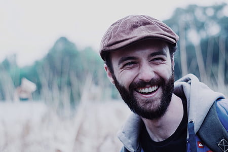 man smiling outdoors thumbnail