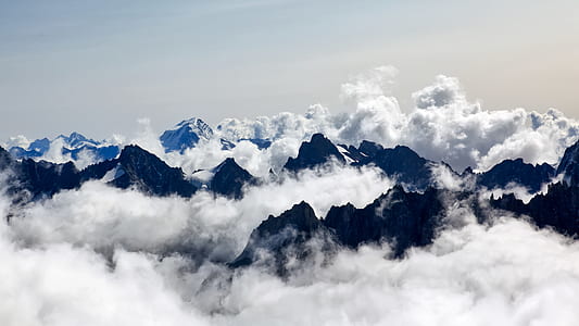 photo of mountain covered by snow during daytime thumbnail