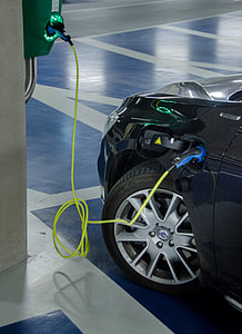 black car parked on concrete floor thumbnail