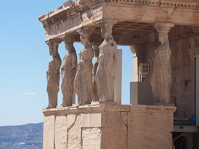 woman-themed statue temple at daytime thumbnail