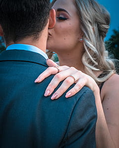 Woman Kissing Man on Cheek thumbnail