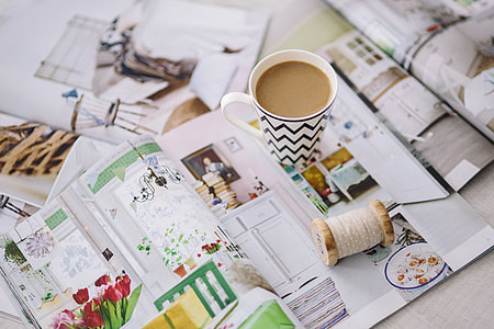 Coffee with home decor magazines thumbnail