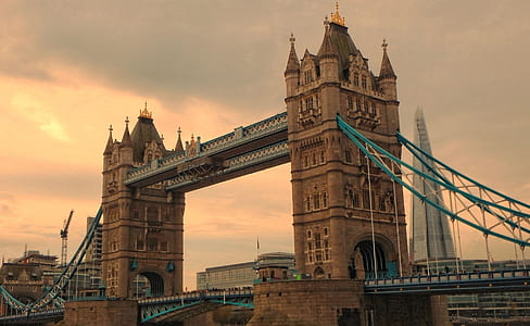 brown concrete bridge near tower thumbnail