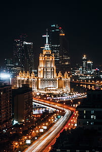 lighted buildings at night thumbnail
