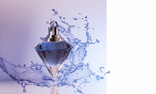 time lapse photography of fragrance bottle with water dew wallpaper thumbnail