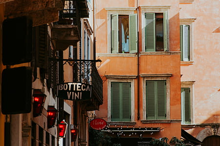 Botteca Vini sign on brown concrete structure thumbnail