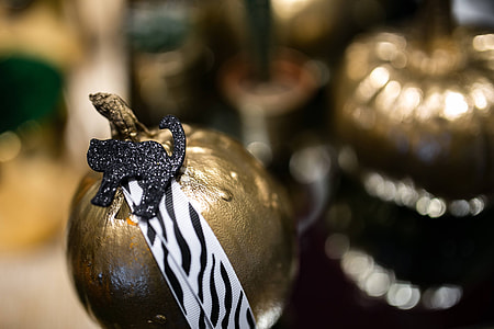 Golden ornamental pumpkins with cactuses thumbnail