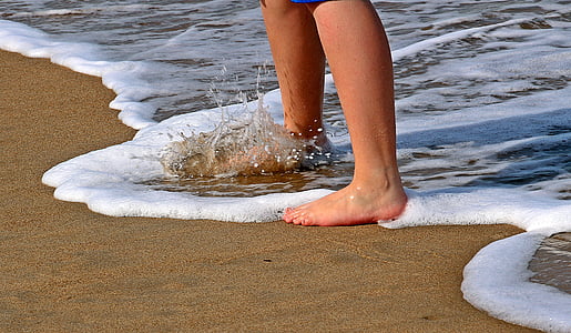 person standing on shoreline thumbnail