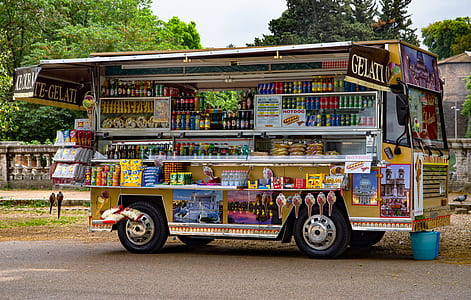 yellow and multicolored Gelati food kiosk thumbnail