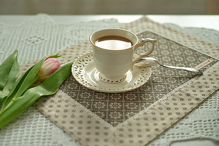 white ceramic tea cup with saucer thumbnail