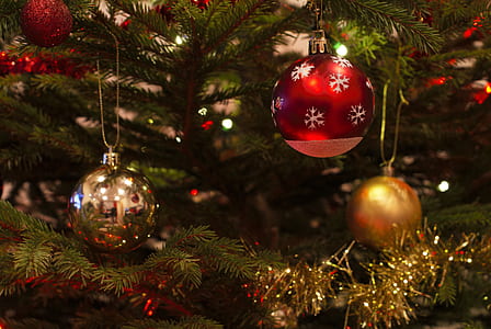 red, gray, and gold baubles on Christmas tree thumbnail