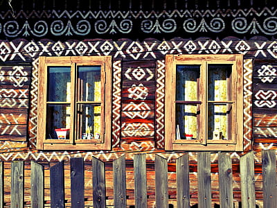 closed brown wooden windows at daytime thumbnail