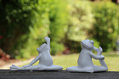 two white ceramic frog figurines thumbnail