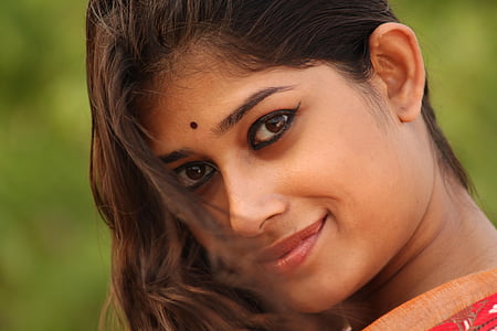 woman in red and orange top thumbnail