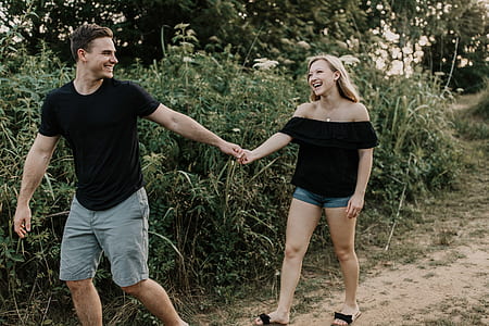 woman holding man's hand thumbnail
