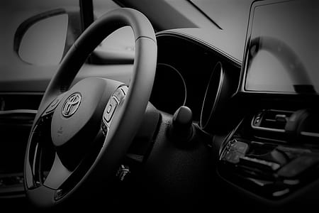 grayscale photography of Toyota vehicle steering wheel thumbnail
