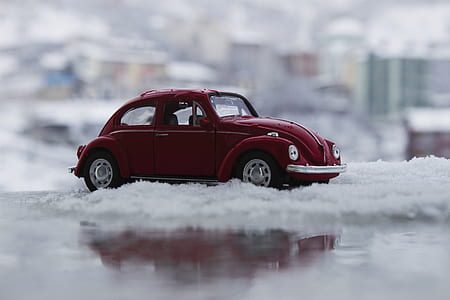 Red Toy Car in Snow thumbnail