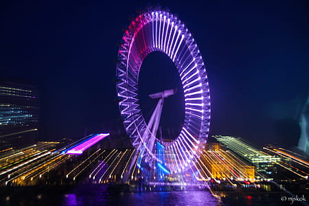 time-lapse photography of ferris wheel during nighttime thumbnail