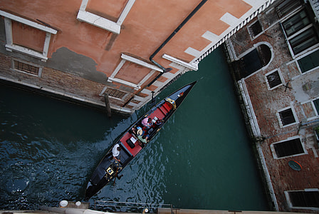 black and red gondola boat on Venice Canal thumbnail